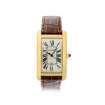 CARTIER | REFERENCE 1740 TANK AMERICAINE  A YELLOW GOLD RECTANGULAR AUTOMATIC WRISTWATCH WITH DATE, CIRCA 2000