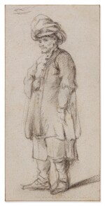 Standing figure of a man in a turban