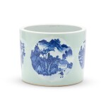 A celadon-ground blue and white scrollpot, Qing dynasty, 19th century | 清十九世紀 粉青地開光青花山水紋畫筒
