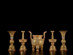 An exceptionally rare gold-ground famille-rose five-piece altar set (wugong), Seal marks and period of Qianlong | 清乾隆 金地粉彩纏枝蓮八吉祥紋五供一套 《大清乾隆年製》款