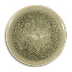 A molded 'Yaozhou' celadon-glazed 'floral' bowl, Northern Song / Jin dynasty | 北宋 / 金 耀州窰青釉印纏枝花卉紋盌