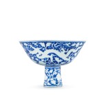 A very rare incised blue and white 'dragon' stem bowl, Seal mark and period of Qianlong | 清乾隆 青花留白暗劃穿蓮龍紋高足盌 《乾隆年製》款