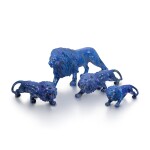 Five jewelled carved hardstone figures of prowling lions, late 20th century 