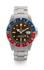 ROLEX | GMT-MASTER, TROPICAL EXCLAMATION POINT DIAL WITH EAGLE BEAK CROWN GUARDS, REFERENCE 1675,  STAINLESS STEEL DUAL-TIME WRISTWATCH WITH DATE AND BRACELET,  CIRCA 1961