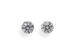 A Pair of 0.58 and 0.56 Carat Round Diamonds, G and H Color, VS2 and VS1 Clarity