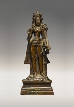 A COPPER ALLOY FIGURE OF TARA WITH SILVER INLAY,  KASHMIR, 9TH/10TH CENTURY