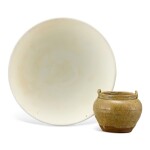 A XING WHITE-GLAZED CONICAL BOWL, TANG DYNASTY AND A YUE CELADON JARLET, WESTERN JIN DYNASTY | 唐 刑窰白釉笠式盌  西晉 越窰青釉雙繫罐