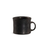 A small black pottery cup, Longshan culture, c. 2500-2000 B.C. 龍山文化 黑陶盃