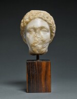 A Fragmentary Marble Head of a Goddess, circa 2nd Century A.D.