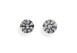 A Pair of 1.00 Carat Round Diamonds, D Color, SI1 Clarity