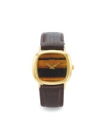  PIAGET | A YELLOW GOLD WRISTWATCH WITH TIGER'S EYE DIAL CIRCA 1975