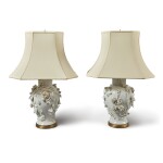 An Assembled Pair of Continental White Porcelain  Baluster Vases Mounted as Lamps