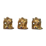 A set of three glass-inlaid gilt-bronze 'bear' supports, Han dynasty 漢 鎏金銅嵌琉璃熊形承足一組三件