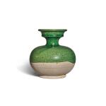 A green and amber-glazed pottery zhadou, Tang dynasty | 唐 綠釉渣斗