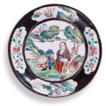 A BLACK-GROUND PAINTED ENAMEL 'EUROPEAN SUBJECT' SAUCER DISH,  QING DYNASTY, 18TH CENTURY