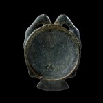 An Egyptian Steatite Offering Spoon, New Kingdom, 1550-1075 B.C.  