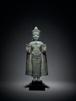 A Copper Alloy Figure of Standing Buddha, Thailand, Lopburi style, 13th Century