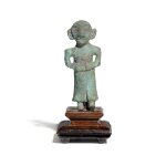 A possibly unique bronze figure of a standing man, Southwest China, Late Shang - Zhou dynasty | 商末至周 中國西南地區青銅人像飾件