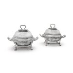 A pair of George III silver entrée dishes and Sheffield Plate stands, Benjamin Smith, London, 1807