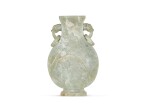 A celadon jade 'prunus' vase Qing dynasty, 19th century 清十九世紀 青白玉梅花雙龍活環耳壺