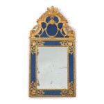 A FRENCH REGENCE GILTWOOD MIRROR WITH LATER BLUE GLASS PLATES