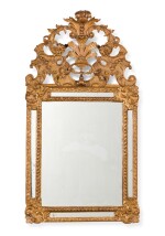 A REGENCE CARVED GILTWOOD AND GESSO MIRROR, CIRCA 1725
