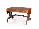 A Regency style gilt-brass mounted rosewood library table, circa 1900 | Table de bibliothèque en palissandre et laiton doré de style Régency, vers 1900