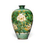 An extremely rare sancai-glazed 'peony' meiping, Jin dynasty | 金 三彩牡丹紋梅瓶