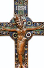 FRENCH, LIMOGES, 13TH CENTURY | A CHAMPLEVÉ ENAMEL CRUCIFIX 