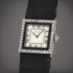 A platinum, yellow gold, diamond and onyx-set wristwatch | Circa 1925