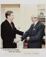 RONALD REAGAN, SIGNED PHOTOGRAPH OF THE PRESIDENT AND HAYEK, [1983]