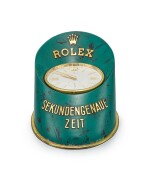 ROLEX | A GILT BRASS AND PAINTED HOOF-SHAPED DISPLAY DESK CLOCK WITH STOP FEATURE AND ORIGINAL WOODEN BOX, CIRCA 1960