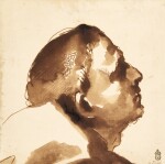 The head of a man in profile, looking up