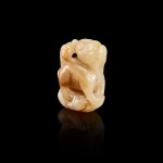A white and russet jade mythical beast, Ming dynasty 明 白玉瑞獸