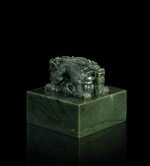 An imperial Khotan-green jade 'tian'en baxun zhi bao' seal, Qing dynasty, Qianlong period |  清乾隆 乾隆帝御寶和闐青玉交龍鈕璽 印文：天恩八旬之寶