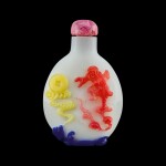 A five-colour overlay white glass 'Liu Hai' snuff bottle Qing dynasty, 18th century | 清十八世紀 涅白地套五色劉海戲金蟾圖鼻煙壺