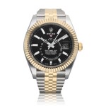  Reference 326933 Sky-Dweller | A yellow gold and stainless steel automatic wristwatch with annual calendar, dual time zone and bracelet, Circa 2021