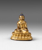 A gilt-copper alloy figure of Shakyamuni Buddha Tibet, 13th-14th century | 西藏 十三至十四世紀 鎏金銅合金釋迦牟尼佛坐像