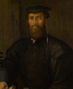 Portrait of a young man in a black cap