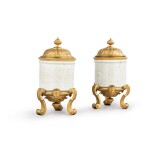 A pair of French Régence style gilt-bronze mounted Chinese porcelain covered vases, 19th century