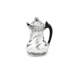  A small silver spirally-fluted coffee-pot on flat base, Arnaud Lacaze, Montauban, 1750-1751 | Cafetière égoiste marabout à côtes torses en argent par Arnaud Lacaze, Montauban, 1750-1751