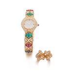 Gem set and diamond wristwatch and a ruby and diamond ring
