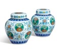 A fine pair of doucai 'chrysanthemum' jars and covers, Seal marks and period of Qianlong |  清乾隆 鬪彩番蓮團菊紋蓋罐一對 《大清乾隆年製》款