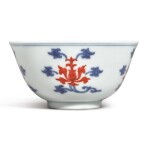 AN UNDERGLAZE-BLUE AND IRON-RED 'LOTUS' WINE CUP,  YONGZHENG MARK AND PERIOD