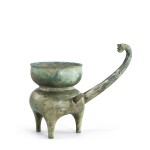 A rare archaic bronze ritual pouring vessel, he Western Han dynasty | 西漢 青銅獸把盉