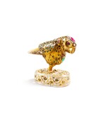 A Mughal ambered rock crystal, gold and precious stones parrot, 19th century | Perroquet en cristal de roche ambré et transparent, or et pierres précieuses, travail Moghol du XIXe siècle