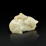 A white and russet jade 'boy and buffalo' group, Qing dynasty, 18th century |  清十八世紀 白玉童子牧牛