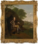 ARTHUR DEVIS | PORTRAIT OF A GENTLEMAN, POSSIBLY THE REVEREND WILLIAM OF DIGBY, OF LANDENSTOWN, COUNTRY KILDARE, FULL-LENGTH, SEATED BENEATH A TREE, A GUN AND PHEASANT BY HIS SIDE