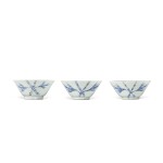 Three small blue and white 'bamboo and phoenix' cups, Qing dynasty, 18th century | 清十八世紀 青花「瑞竹祥鳳」紋笠式盃一組三件