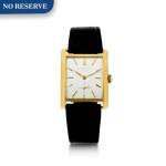 PATEK PHILIPPE | REFERENCE 2530 'CURVED TANK'  A YELLOW GOLD RECTANGULAR WRISTWATCH, MADE IN 1967